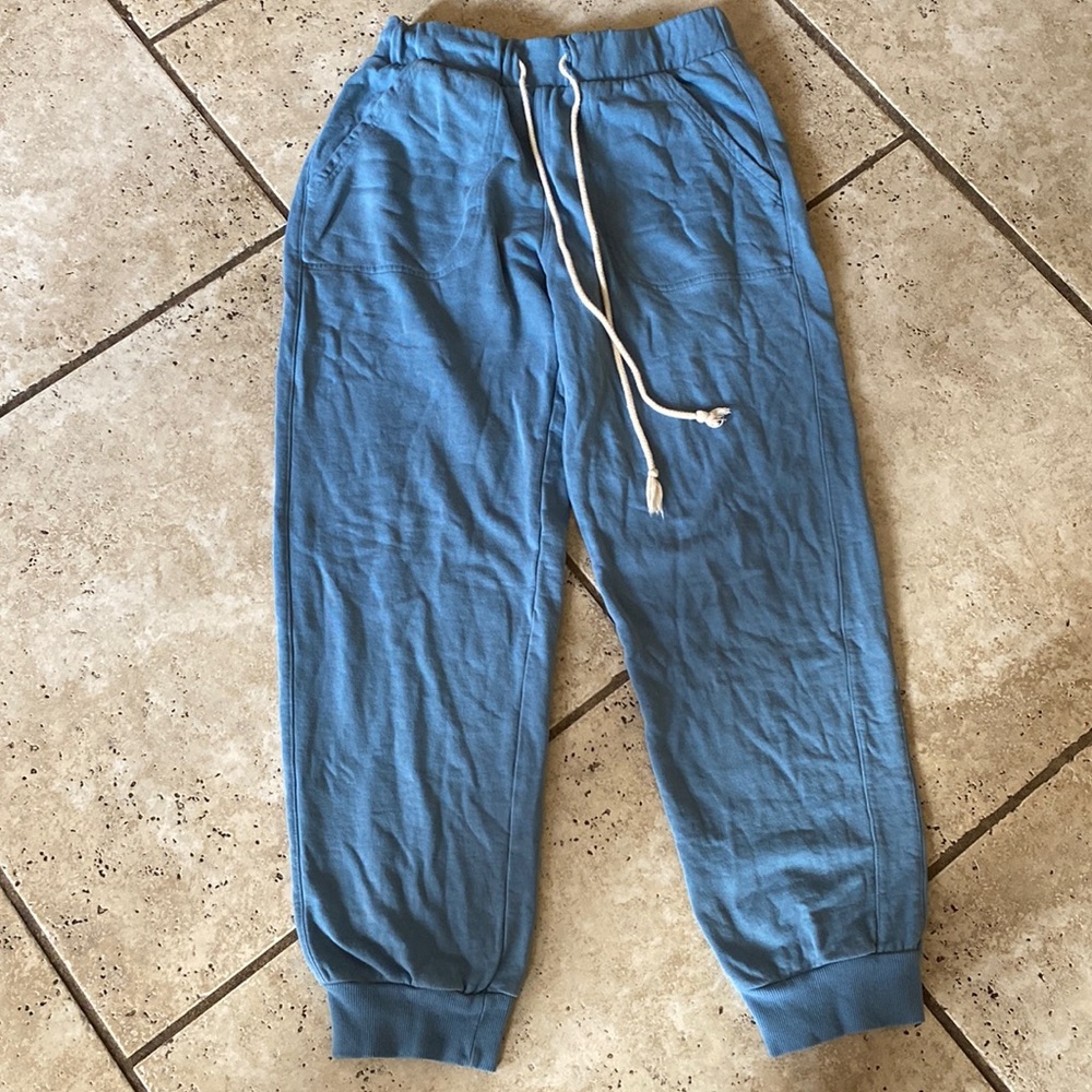 Blue cozy sweatpants with white string